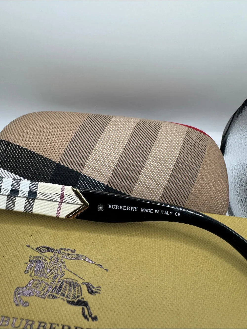 Burberry Black Cat-Eye Sunglasses with Beige Check Arms and Gold Accents